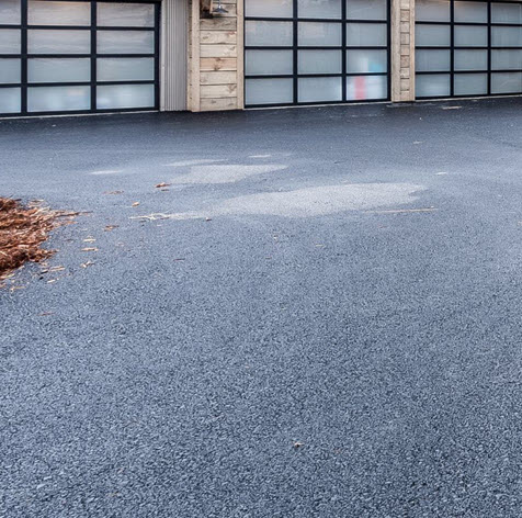 New Asphalt Driveway Leading To Farm Shed